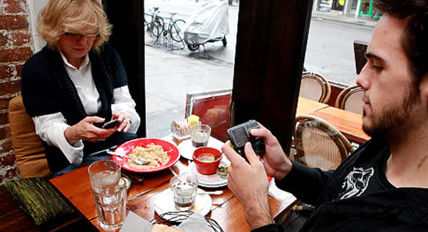 Texting in restaurant