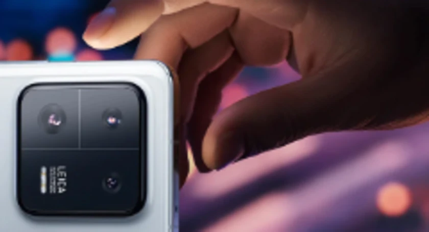 Hand grabs xiaomi 13 pro