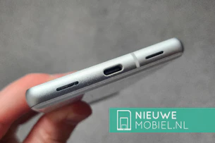 Bottom of the Google Pixel 7a in Snow White