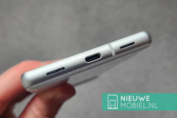 Bottom of the Google Pixel 7a in Snow White